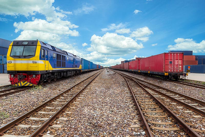 Cargo train platform with freight train container at depot in port use for export logistics background